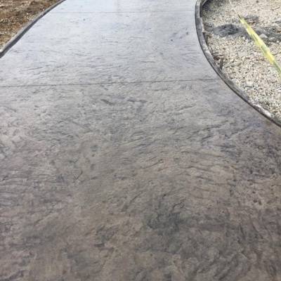 Affordable concrete walkway providing a smooth and durable path for outdoor spaces in residential areas