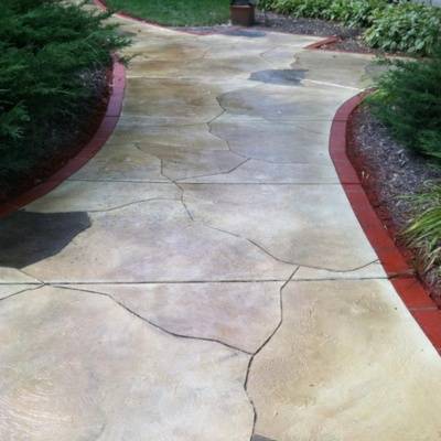 Colorful concrete patio installation in Waukesha enhances outdoor space with unique design and craftsmanship