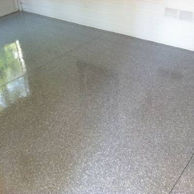 Stained concrete flooring in Waukesha showcases a smooth, polished surface enhancing indoor aesthetics and functionality